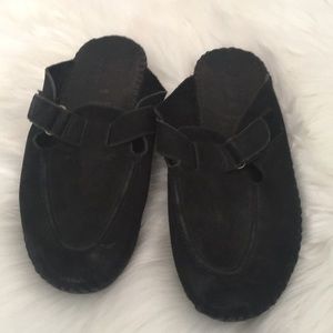 Black leather clogs